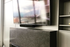 A dropdown fireplace TV mount
